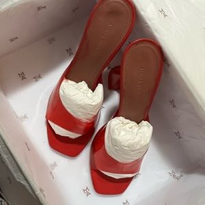 AMINA MUADDI
Lupita PVC sandals 
made in Italy 
RED